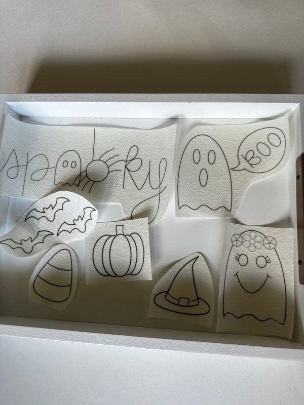 Embroidered Halloween applique set with ghost, pumpkin, bat, and Boo shapes on white felt