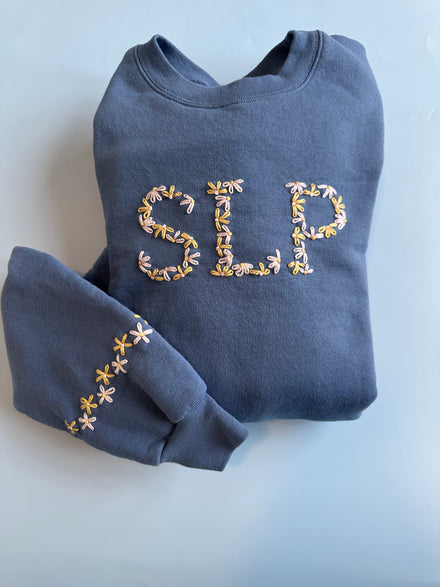 Daisy alphabet stitched on clothing