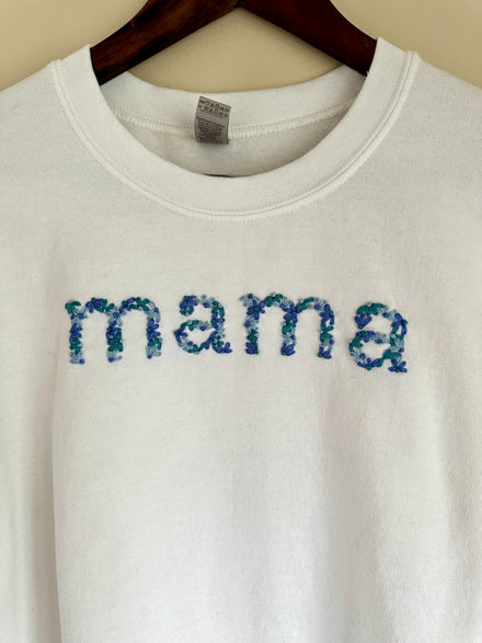 Alphabet and words stitched on clothing