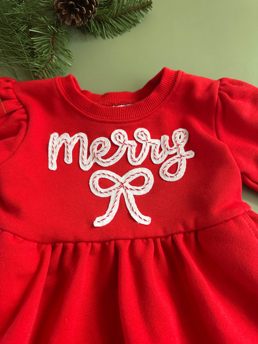 Hand-embroidered Christmas designs on clothing