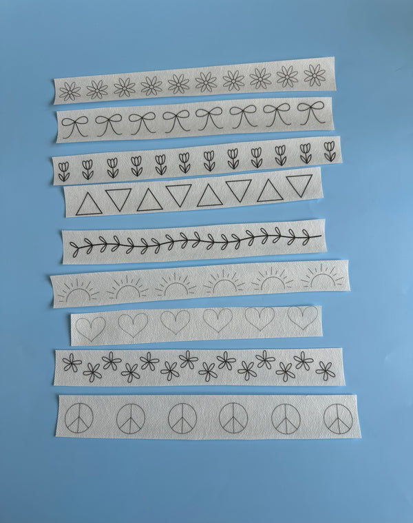 Embroidery design bundle with 9 decorative bands: floral, hearts, geometric linework.